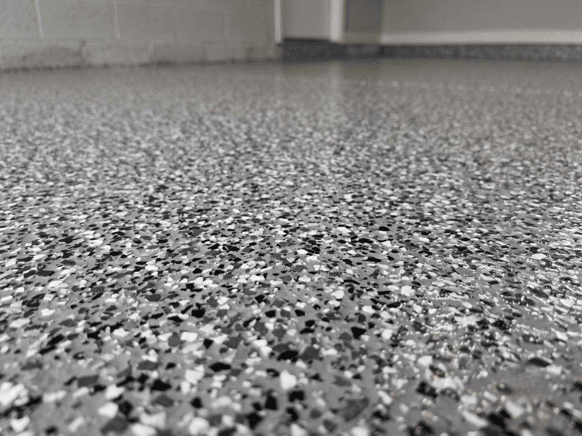 Epoxy flake floor in a garage workshop space