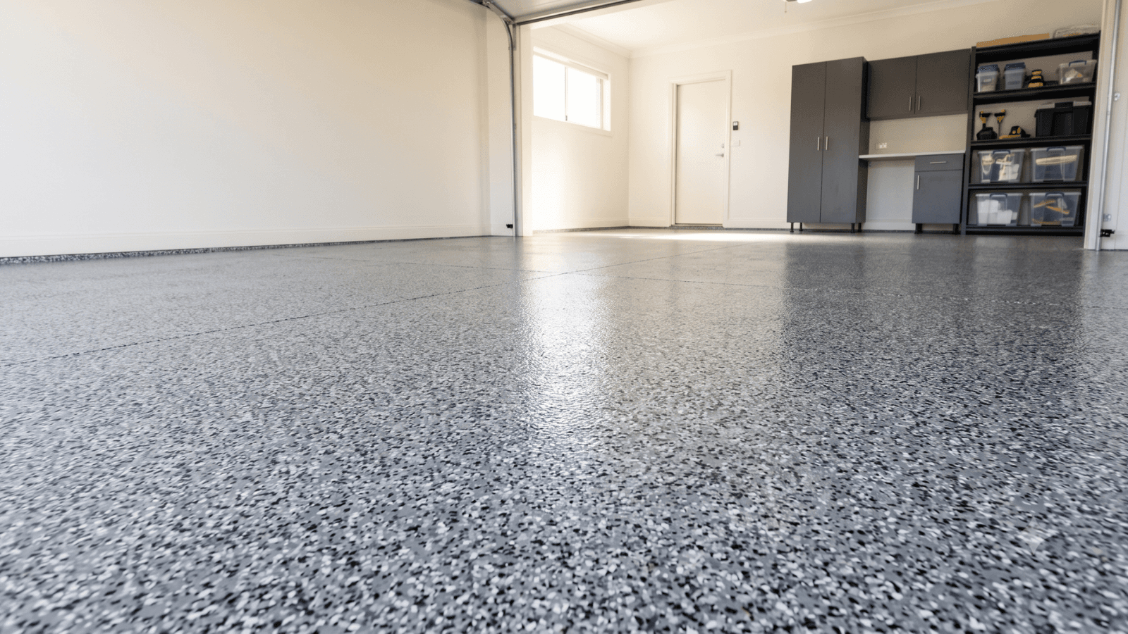 Residential garage floor with a clean, sealed concrete surface